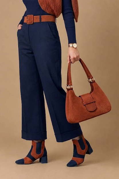 Women's navy blue and terracotta two-tone chelsea boots with round toe and low flared heel - Worn view